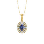 Elegant 14K Yellow Gold Ladies Pendant Featuring Oval Sapphire And Round Diamond Accents 1.16Ct Includes Chain For A Complete Luxury Look.